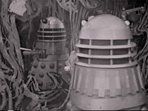 In this very rare production still taken during rehearsals, two Dalek props line up before Camera 5.... oh, no. Wait.  This is a screen-grab from the finished episode.  Sorry.